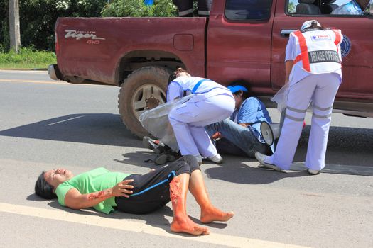 SURAT THANI, THAILAND - OCTOBER 4 : Practicing fire protection plan and rescue car accident on October 4, 2012 in Surat Thani, Thailand.