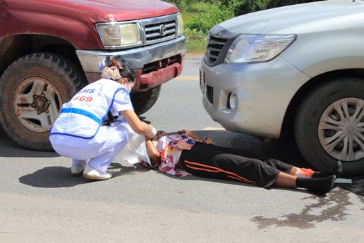 SURAT THANI, THAILAND - OCTOBER 4 : Practicing fire protection plan and rescue car accident on October 4, 2012 in Surat Thani, Thailand.