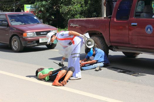 SURAT THANI, THAILAND - OCTOBER 4 : Practicing fire protection plan and rescue car accident on October 4, 2012 in Surat Thani, Thailand.