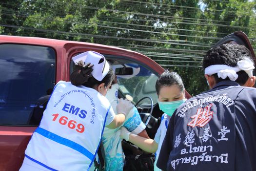 SURAT THANI, THAILAND - OCTOBER 4 : Practicing fire protection plan and rescue car accident on October 4, 2012 in Surat Thani, Thailand.