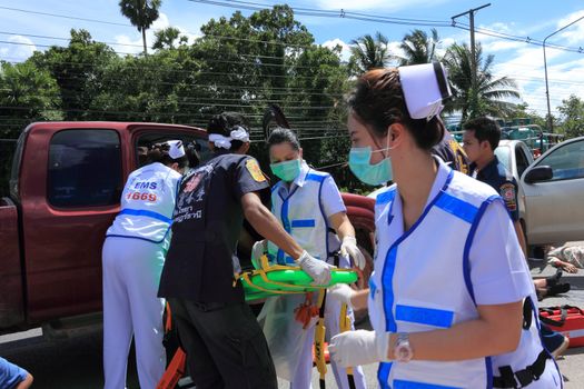 SURAT THANI, THAILAND - OCTOBER 4 : Practicing fire protection plan and rescue car accident on October 4, 2012 in Surat Thani, Thailand.