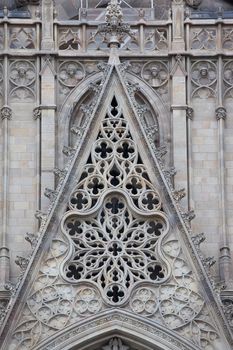 Facade details of famous Gothic Catholic Cathedral, Barcelona, Spain