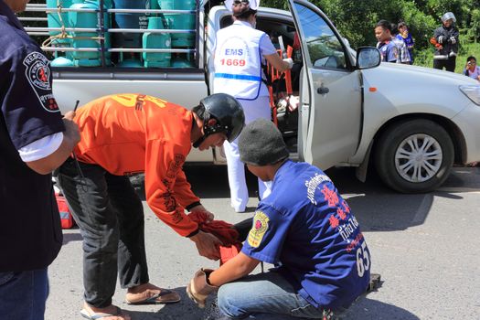 SURAT THANI, THAILAND - OCTOBER 4 : Practicing fire protection plan and rescue car accident on October 4, 2012 in Surat Thani, Thailand.