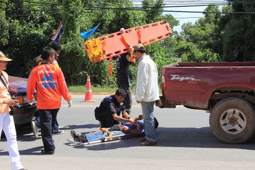 SURAT THANI, THAILAND - OCTOBER 4 : Practicing fire protection plan and rescue car accident on October 4, 2012 in Surat Thani, Thailand.