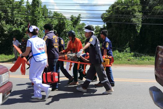 SURAT THANI, THAILAND - OCTOBER 4 : Practicing fire protection plan and rescue car accident on October 4, 2012 in Surat Thani, Thailand.