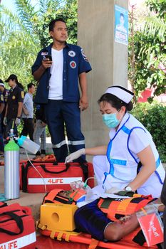 SURAT THANI, THAILAND - OCTOBER 4 : Practicing fire protection plan and rescue car accident on October 4, 2012 in Surat Thani, Thailand.