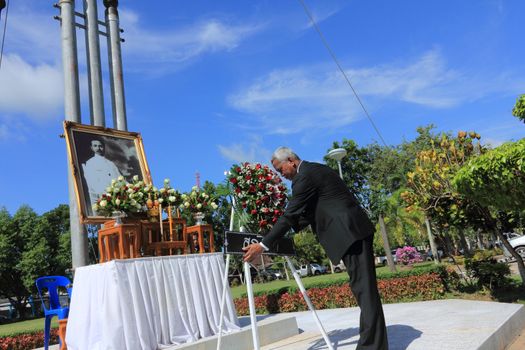 SURAT THANI, THAILAND - AUGUST 7 : Superintendent of the Amphoe Chiya Police Station lay wreath to the picture of Rapee Pattanasak on Rapee Day Prince Rapee Pattanasak, the father of Thailand's modern legal system on August 7, 2013 in Surat Thani, Thailand.