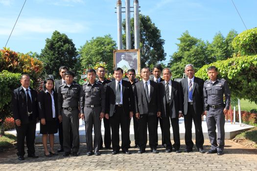 SURAT THANI, THAILAND - AUGUST 7 : Judges,prosecutors,polices, middlemans and government officers to take a group picture after lay wreaths to the picture of Rapee Pattanasak on Rapee Day Prince Rapee Pattanasak, the father of Thailand's modern legal system on August 7, 2013 in Surat Thani, Thailand.