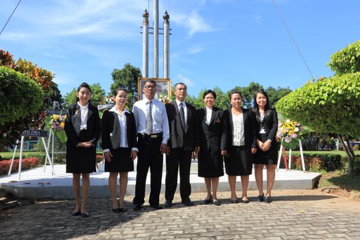SURAT THANI, THAILAND - AUGUST 7 : Prosecutors to take a group picture after lay wreaths to the picture of Rapee Pattanasak on Rapee Day Prince Rapee Pattanasak, the father of Thailand's modern legal system on August 7, 2013 in Surat Thani, Thailand.