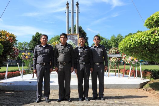 SURAT THANI, THAILAND - AUGUST 7 : Superintendents of Police Station to take a group picture after lay wreaths to the picture of Rapee Pattanasak on Rapee Day Prince Rapee Pattanasak, the father of Thailand's modern legal system on August 7, 2013 in Surat Thani, Thailand.