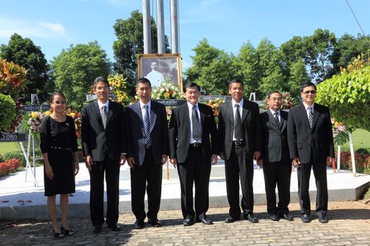 SURAT THANI, THAILAND - AUGUST 7 : Judges of Chiya provincial court to take a group picture after lay wreaths to the picture of Rapee Pattanasak on Rapee Day Prince Rapee Pattanasak, the father of Thailand's modern legal system on August 7, 2013 in Surat Thani, Thailand.