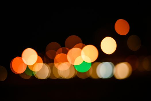 Abstract defocused lights of the night city bokeh background