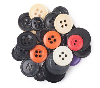 Heap of old-fashioned retro buttons over white background