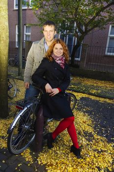 Outdoor happy couple in love,autumn Amsterdam background