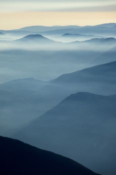 High mountain landscape in hazy weather