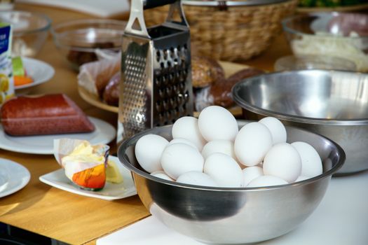 A log of eggs on the table at the cuisine