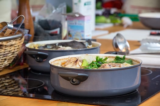 Soup in the saucepan with meat and vegetables