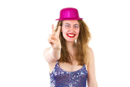 Young woman at party showing v sign