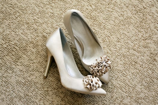 Wedding shoes with a bow and on a high heel
