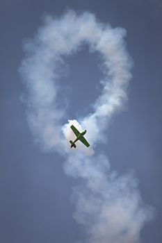 Aerobatcs plane practicing in the sky