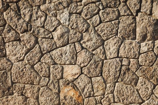 Old stone wall texture closeup