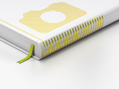 Tourism concept: closed book with Gold Photo Camera icon on floor, white background, 3d render