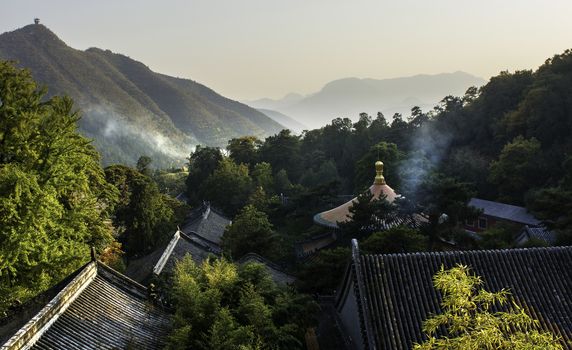 Burning incense for pray in Tanzhe temple in Beijing, China.