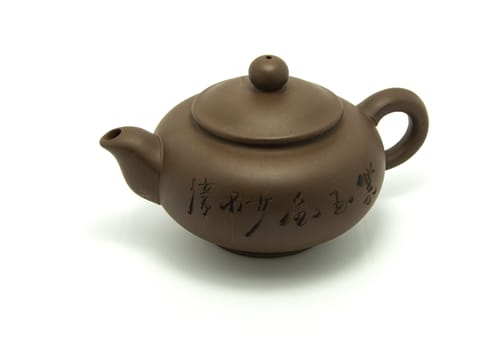 The traditional chinese pottery teapot.