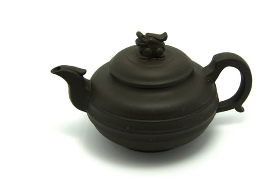 The traditional chinese pottery teapot.