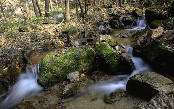 The stream of Changbai mountain under the sunlight.