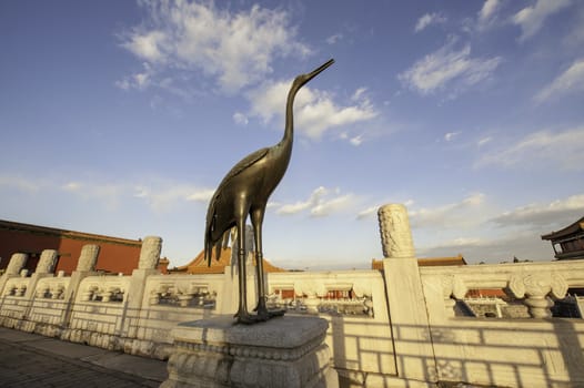 A bronze crane of Forbidden City in Beijing, China.