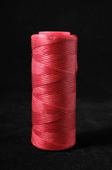 Roll of Twine isolated on a Black Background