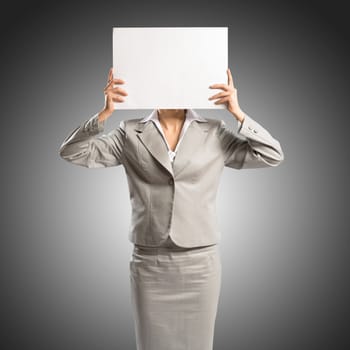 business woman holding a poster, place for text