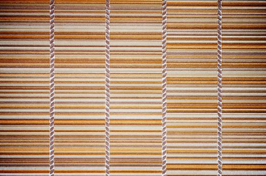 Textured Background of Striped Woven Tablecloth closeup