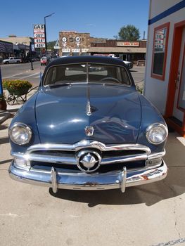 PAGE - SEPTEMBER 22: Classic blue Ford car parking at "Pete's Gas Station" on Route 66. Taken in Page, Arizona, USA on September 22, 2011