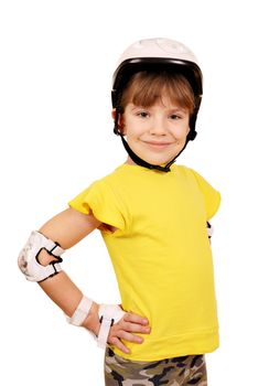 little girl with protective gear for roller skates