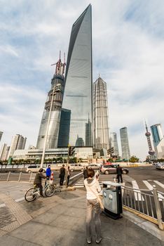 Shanghai, China - April 7, 2013: people in the streets of pudong at the city of Shanghai in China on april 7th, 2013