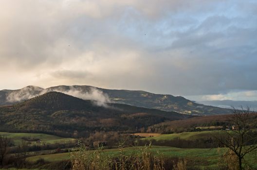 Tuscany countryside illuminated by the sun after a rain storm