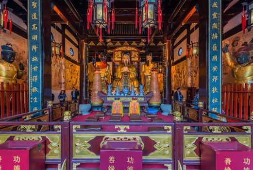 Shanghai, China - April 7, 2013: statues in the city god temple Chenghuang Miao at the city of Shanghai in China on april 7th, 2013