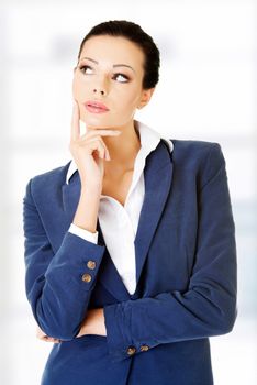 Attractive happy businesswoman, isolated on white