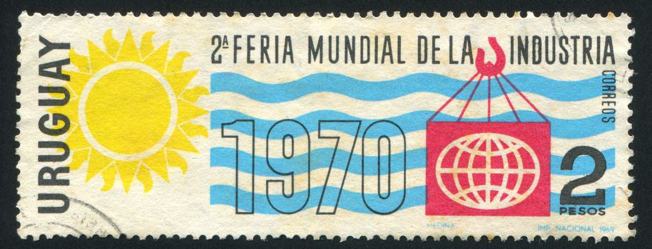 URUGUAY - CIRCA 1969: stamp printed by Uruguay, shows Industrial World Fair Emblem, circa 1969