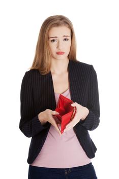 Business woman is showing her empty wallet. Isolated on white.