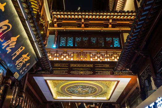 Shanghai, China - April 7, 2013: detail decorations of Fang Bang Zhong Lu old city at night in the city of Shanghai in China on april 7th, 2013