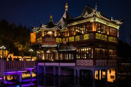 Shanghai, China - April 7, 2013: ancient tea house Fang Bang Zhong Lu old city at night in the city of Shanghai in China on april 7th, 2013