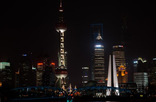 Shanghai, China - April 9, 2013: pudong waterfront at night at the city of Shanghai in China on april 9th, 2013