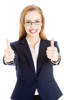 Beautiful business woman showing OK. Isolated on white.