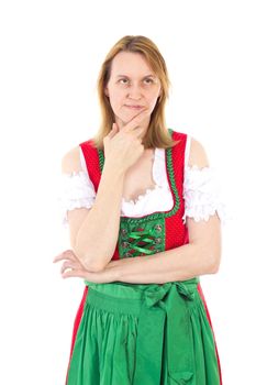 Attractive woman in red green dirndl is thinking