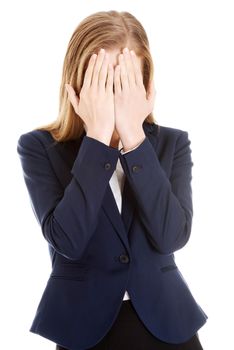 Beautiful business woman covering her face. Isolated on white.