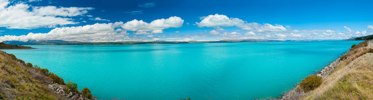 Beautiful incredibly blue lake Pukaki at New Zealand, panoramic photo