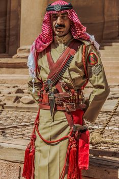 Petra, Jordan - May 11, 2013 arab legion soldier portrait in nabatean petra jordan middle east